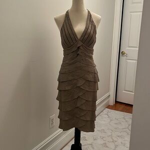 Incredibly flattering halter style dress.